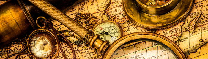 Historical map, watch, and compass.